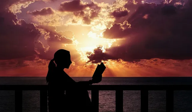 Attractive Woman with Her Books